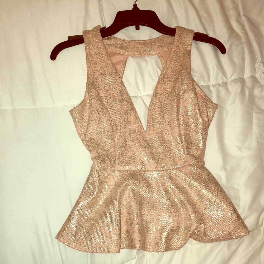 Salmon colored peplum top